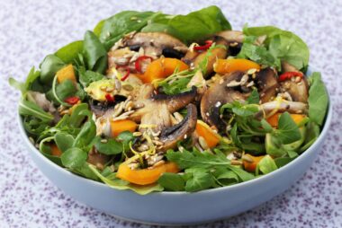 Warm mushroom salad with sesame seeds